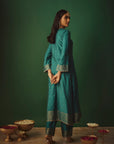 THE FIROZA RUZBEH SUIT