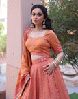 THE AZMAT CORAL LEHNGA