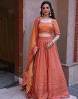 THE AZMAT CORAL LEHNGA