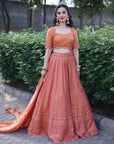 THE AZMAT CORAL LEHNGA