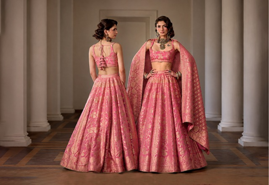 Bride’s sister wearing designer Indian ethnic wear at a wedding