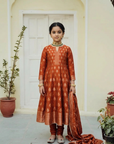 Safaa Rust Vegan Silk Woven Motif Anarkali Set For Girls