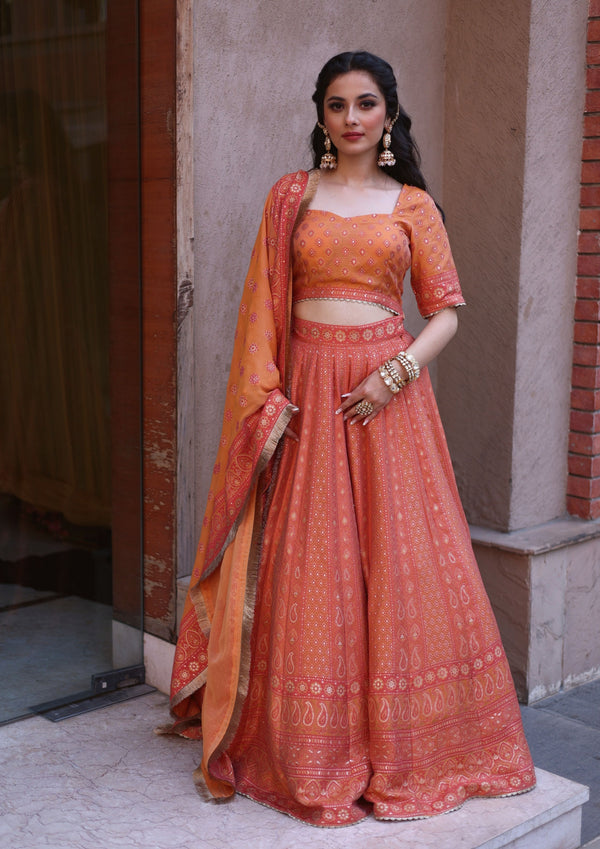 THE AZMAT CORAL LEHNGA